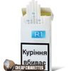 R1 White Super Slims cigarettes, 20-stick hinge-lid box, single pack front view